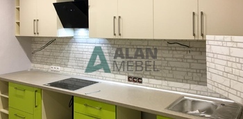 глянцевая кухня угловая с белым верхом, салатовым низом и серой столешницей на заказ