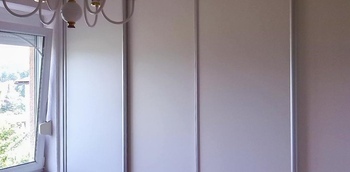 Угловой шкаф-купе для гостиной