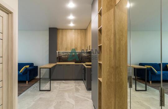 Современная угловая кухня с барной стойкой 