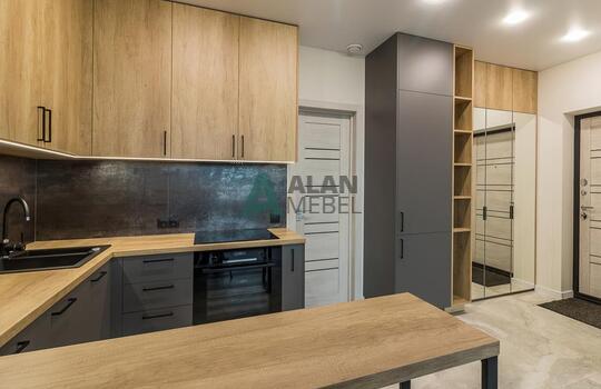 Современная угловая кухня с барной стойкой 