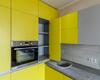 Угловая желтая кухня с фасадами из древесно стружечной плиты с доставкой в Минске
