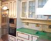 угловая кухня в классическом стиле с патиной и столешницей зеленого цвета на заказ