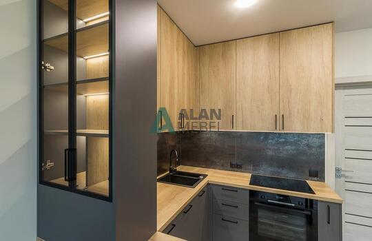 Современная угловая кухня с барной стойкой 