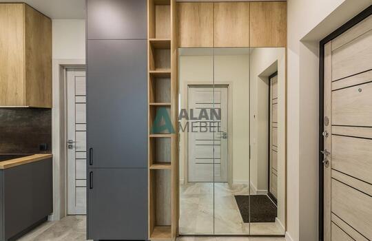 Современная угловая кухня с барной стойкой 